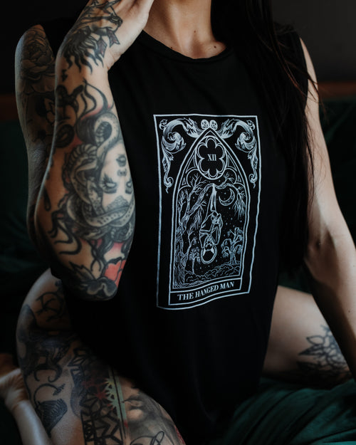 Close-up of Hanged Man Tarot Tank graphic printed on black cotton fabric