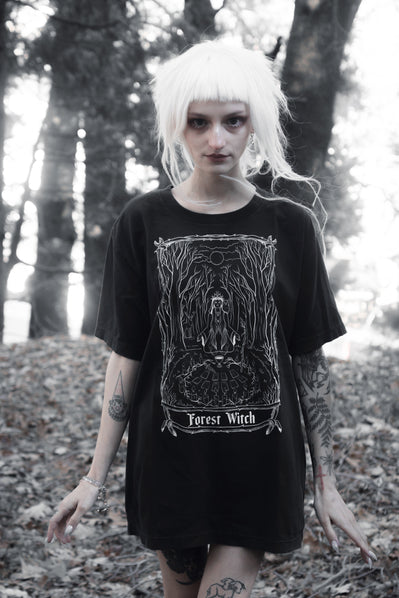 Model styled in the Forest Witch Tee by The Pretty Cult, worn with a casual dark outfit