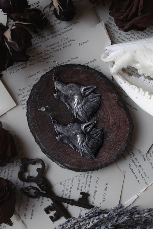 gothic earrings featuring wolf symbolism and elements