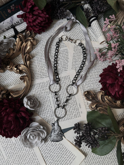 dire bound wolf necklace with ribbon and chain in dark gothic style